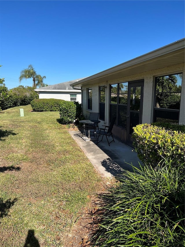 view of yard with a patio area