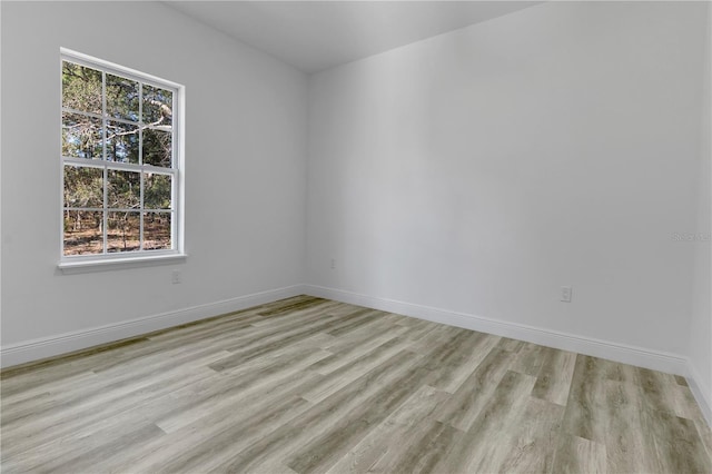 unfurnished room featuring light hardwood / wood-style flooring