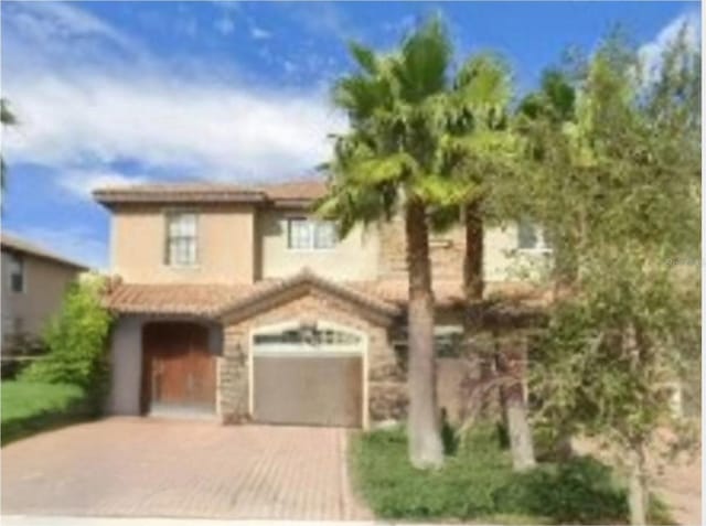 view of front of property featuring a garage