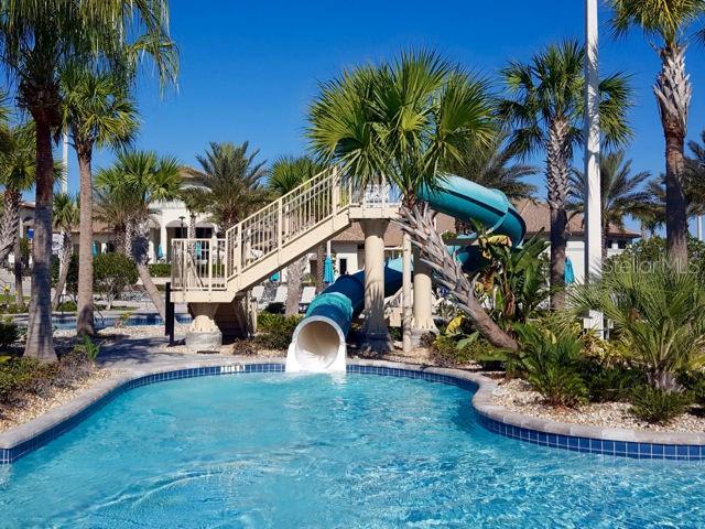 view of swimming pool featuring a water slide