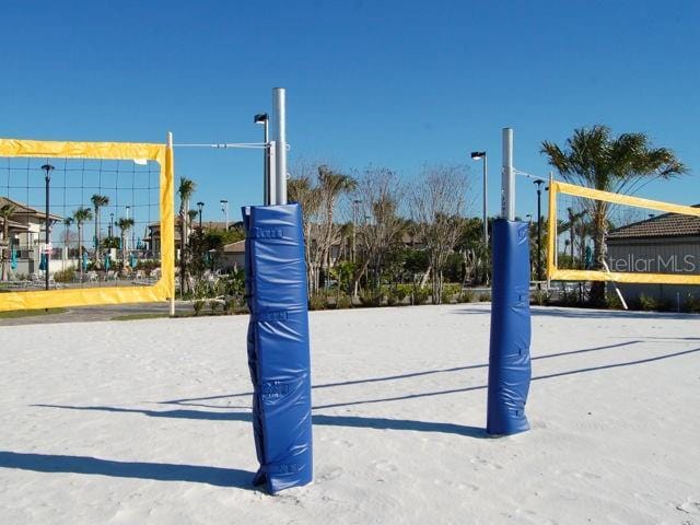 surrounding community featuring volleyball court