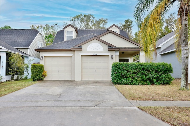 view of front of property featuring a garage