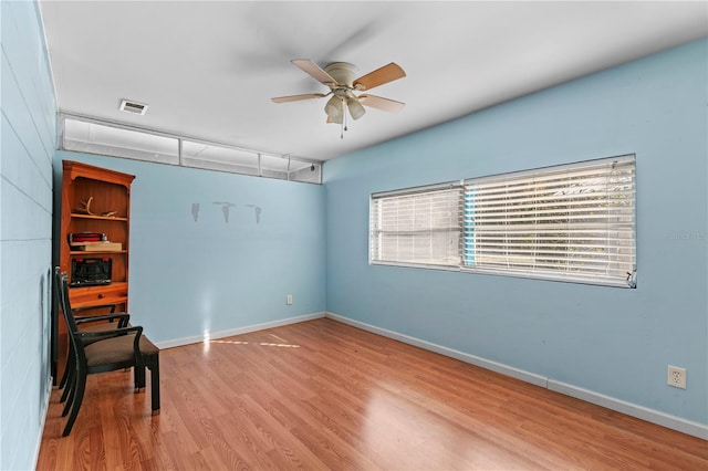 interior space featuring ceiling fan and wood-type flooring