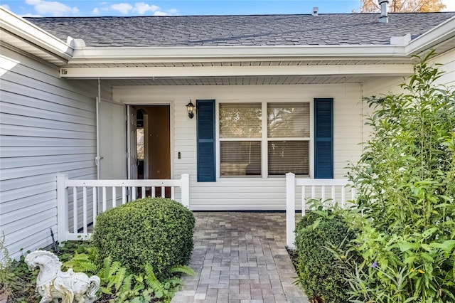 entrance to property with a porch