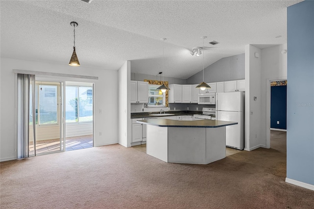 kitchen with sink, hanging light fixtures, white appliances, light carpet, and white cabinets