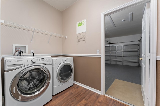 laundry room featuring dark hardwood / wood-style flooring and independent washer and dryer