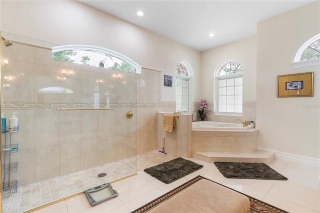 bathroom with tile patterned floors and plenty of natural light