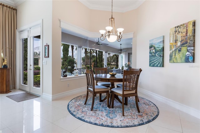 dining area with plenty of natural light, light tile patterned floors, and crown molding