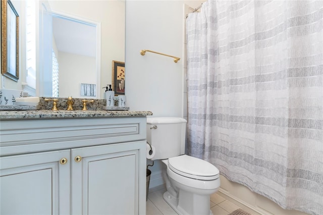 full bathroom featuring tile patterned flooring, vanity, shower / tub combo, and toilet