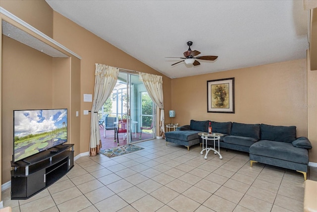 tiled living room with lofted ceiling, ceiling fan, and a textured ceiling