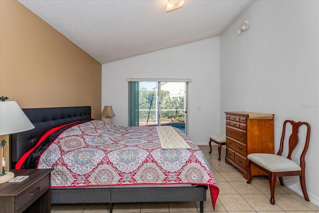 bedroom with access to exterior, light tile patterned floors, a textured ceiling, and vaulted ceiling