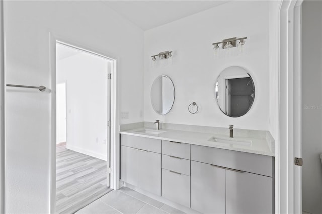 bathroom featuring hardwood / wood-style floors and vanity