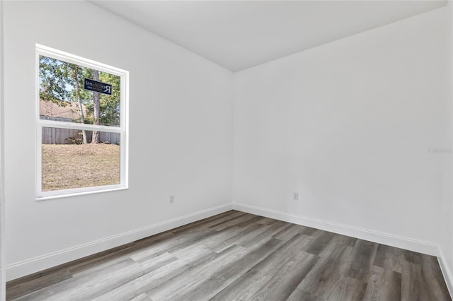 empty room with light hardwood / wood-style floors