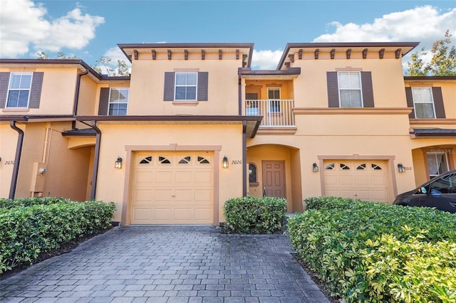 view of front of property with a garage