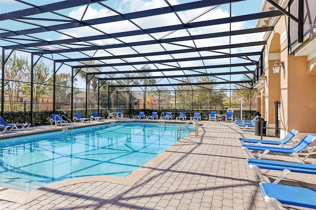 view of pool featuring a lanai and a patio area