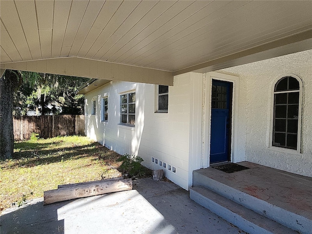 doorway to property with a patio