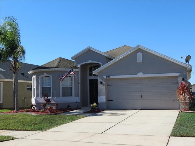 single story home with a garage