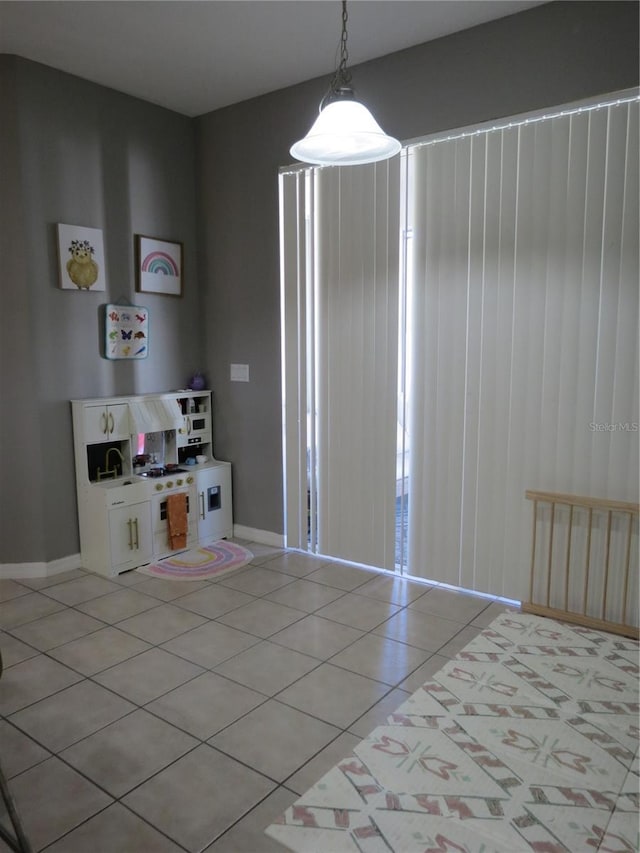 interior space featuring light tile patterned floors