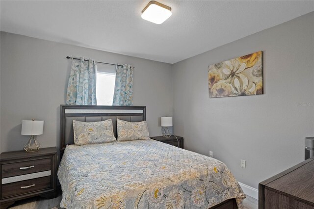 bedroom with light wood-type flooring