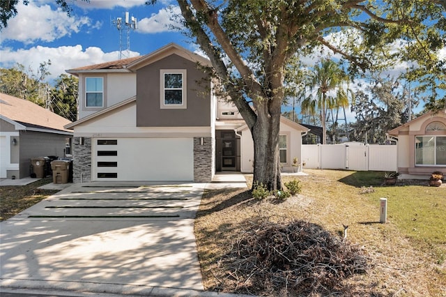 front facade with a front yard and a garage