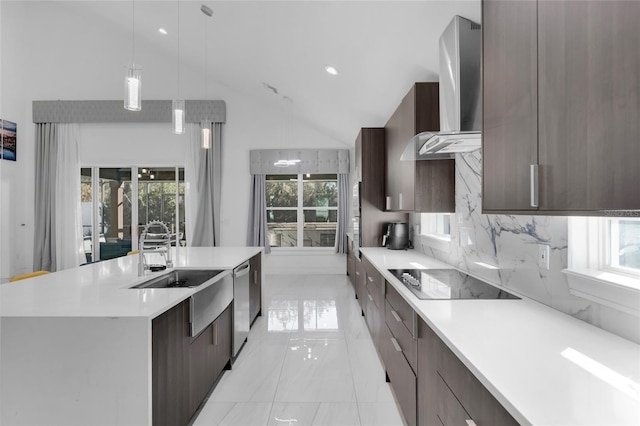 kitchen with black electric stovetop, backsplash, stainless steel dishwasher, wall chimney exhaust hood, and hanging light fixtures