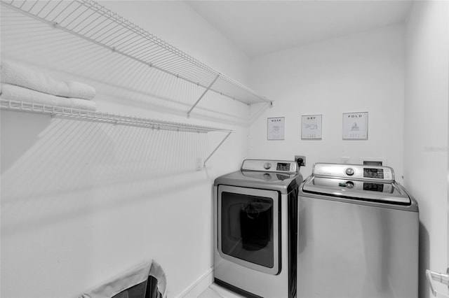 laundry area with washer and dryer