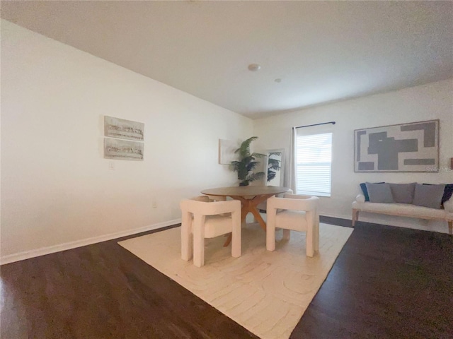 dining space featuring hardwood / wood-style floors