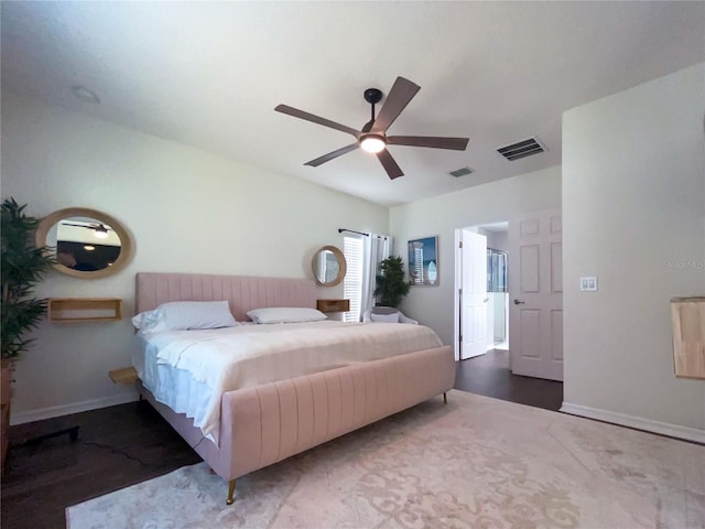 bedroom with ceiling fan and hardwood / wood-style floors