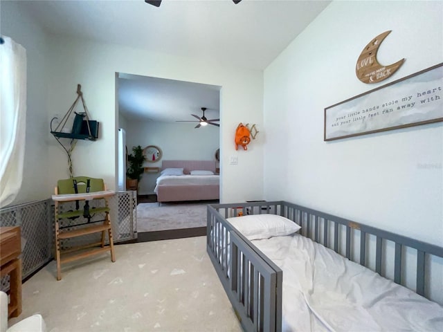 bedroom featuring carpet floors and ceiling fan