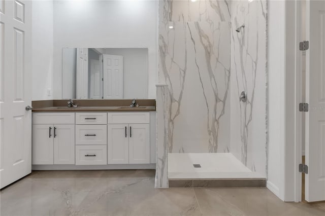 bathroom featuring vanity and walk in shower