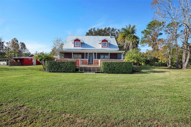 view of front facade featuring a front lawn and covered porch