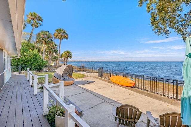 view of patio / terrace featuring a deck with water view