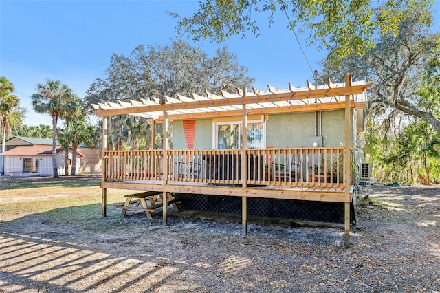 exterior space with a yard and a deck