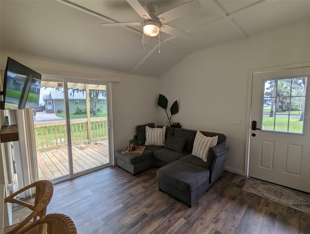 living room with ceiling fan, lofted ceiling, and dark wood-type flooring