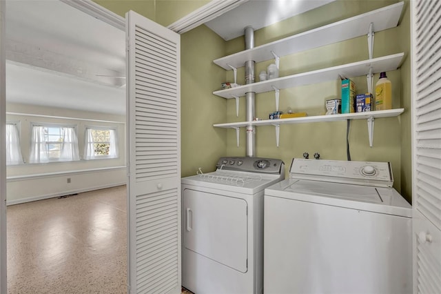 washroom with independent washer and dryer