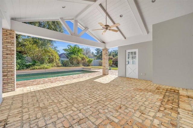 exterior space with ceiling fan