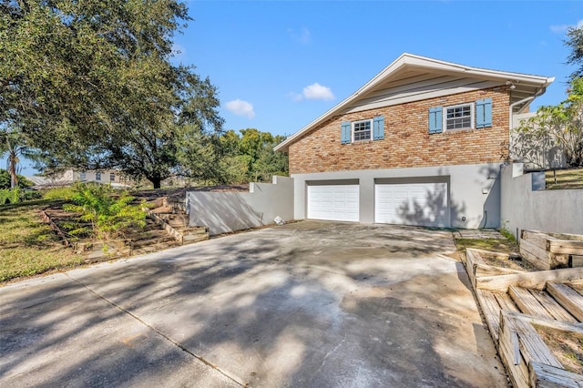 view of property exterior with a garage