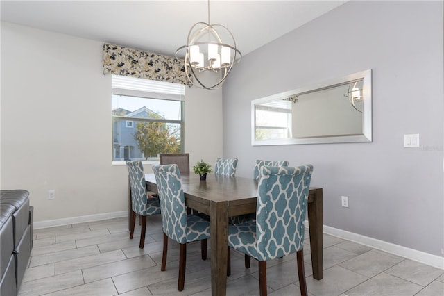 dining space with plenty of natural light and an inviting chandelier