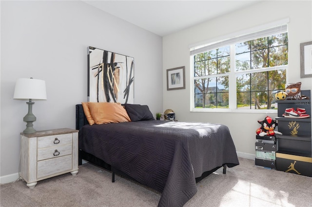 bedroom with light carpet