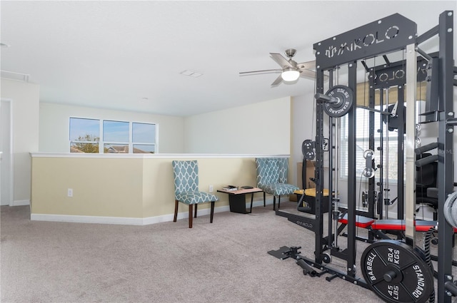 workout area with carpet flooring and ceiling fan