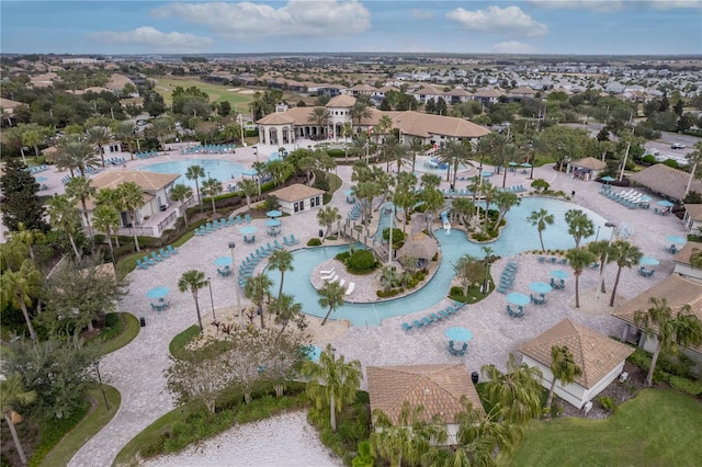 1593 Mulligan Blvd, Davenport, FL 33896 - aerial view of property and surrounding area featuring a pool and nearby suburban area