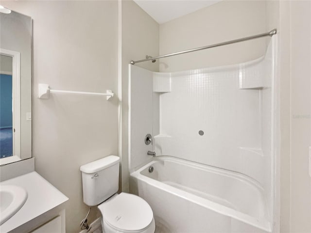 full bathroom featuring bathtub / shower combination, vanity, and toilet