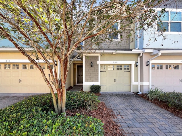 view of front of property with a garage