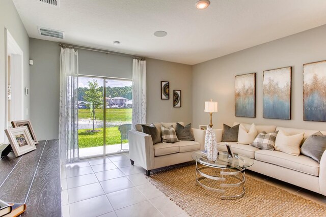 living room with light tile patterned floors