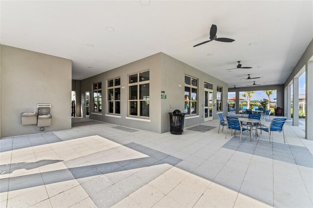 view of patio featuring ceiling fan