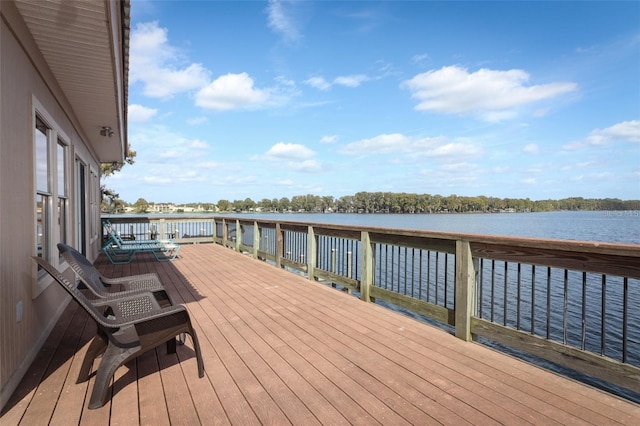 dock area with a deck with water view