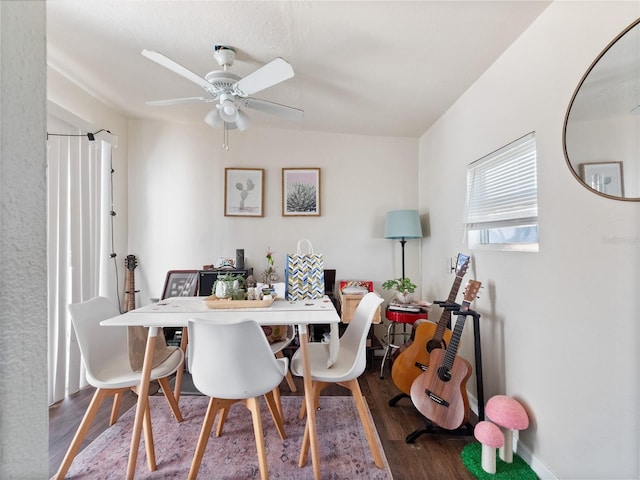 710 Spruce St, New Smyrna Beach, FL 32168 - dining area with wood finished floors and ceiling fan