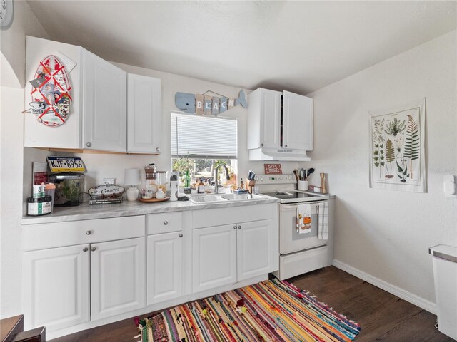 710 Spruce St, New Smyrna Beach, FL 32168 - kitchen featuring white range with electric stovetop, a sink, under cabinet range hood, dark wood finished floors, and baseboards