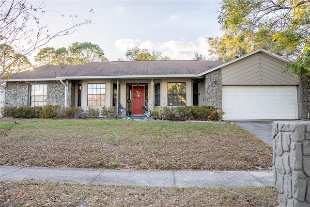 single story home featuring a garage