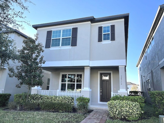 view of front facade featuring covered porch